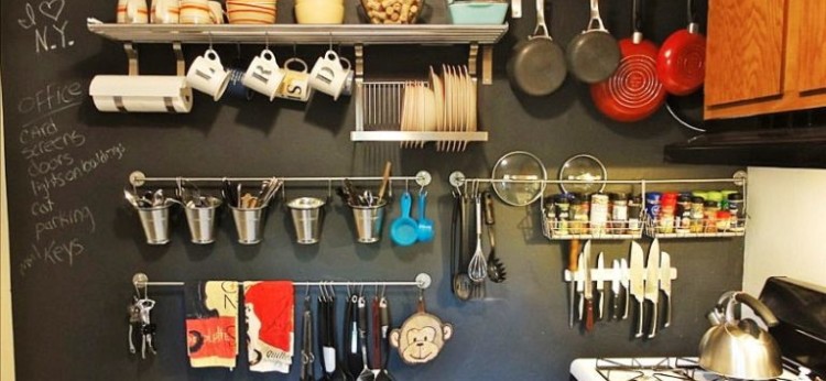 storage space in the kitchen with shelves and hooks